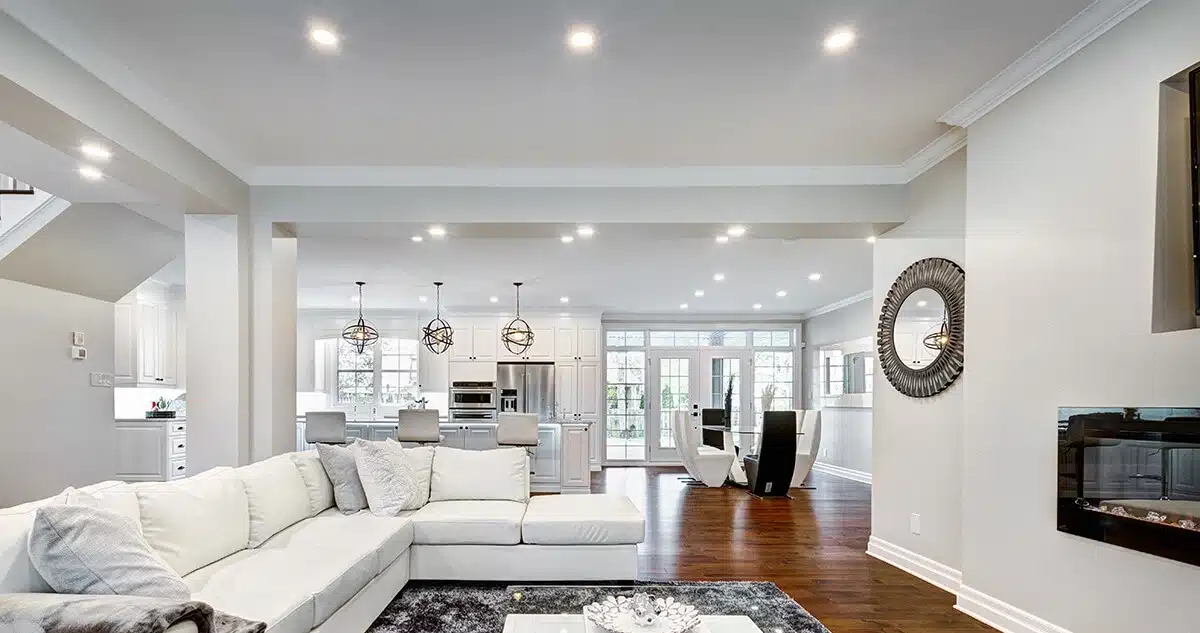 Luxury living room with bright lights on